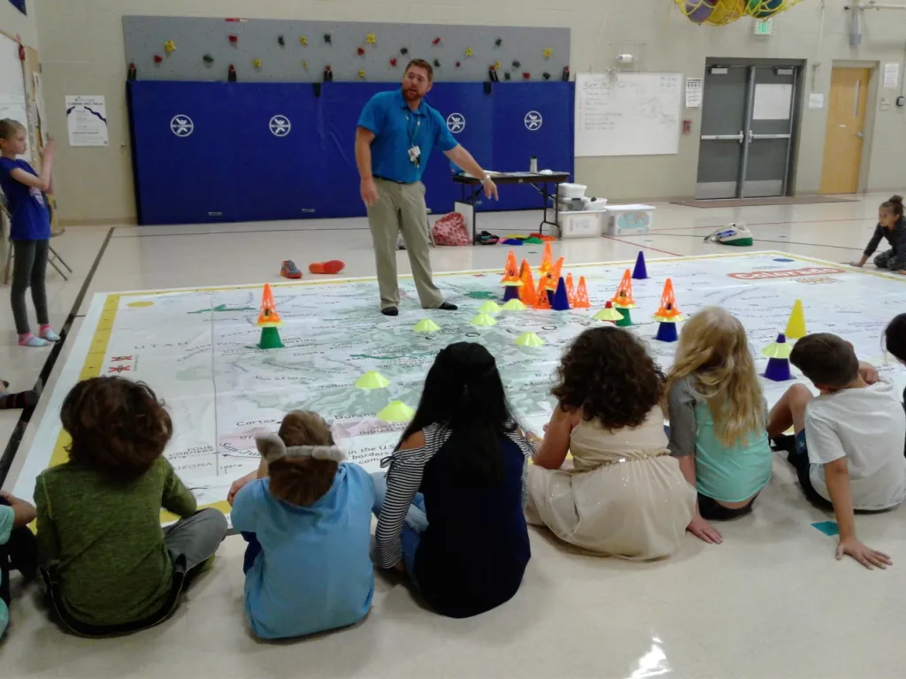 Instruction about population distribution on the Giant Map of Colorado