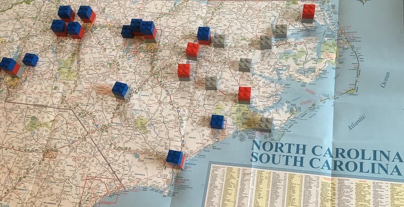 The AAA driving map of North Carolina has LEGOs on it to show the shift in population during the "On the Move" lesson.
