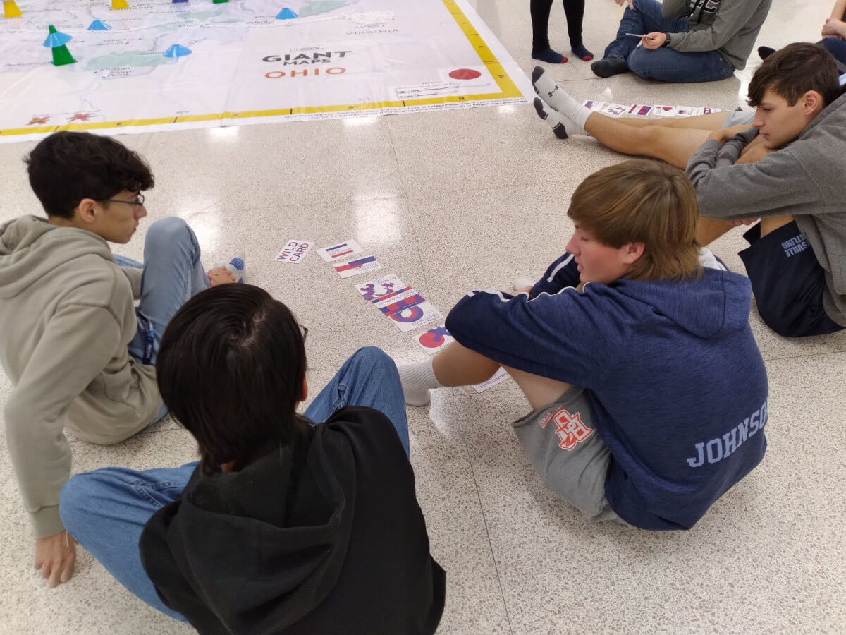 Students exploring Ohio Giant Map and Flashes of Insight Activity